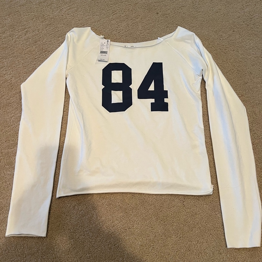 Women's White Long Sleeve Top with Black Print